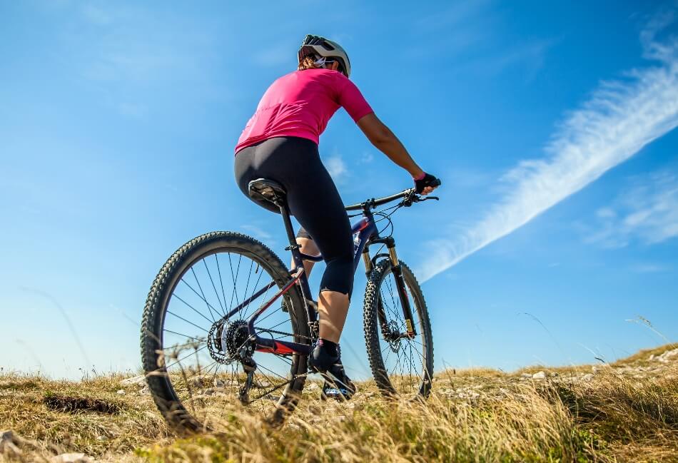 women riding a cycle